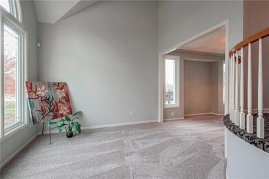 Tons of natural light. Formal living room enters t