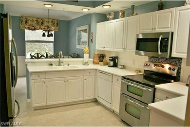 Kitchen area with stainless microwave, French door