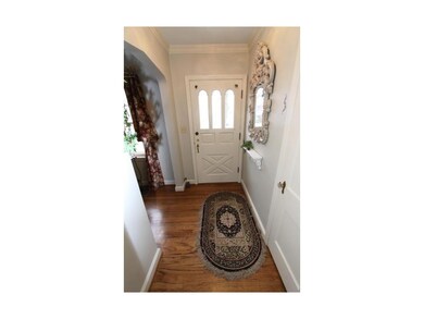 Pretty Entry, original door, wood floors, brushed 