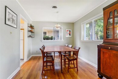 Dining Room off Kitchen that opens to Living Room.