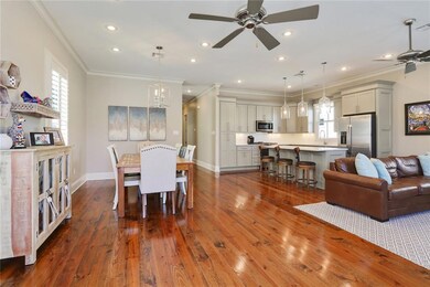 Open floor plan, gleaming floors and tall ceilings