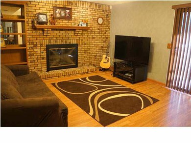 Second Family Room, fireplace and a sliding door t