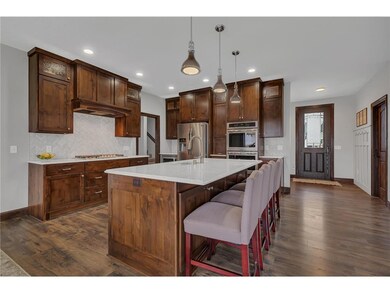 Amazing kitchen with knotty alder cabinetry, great