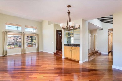 Open Living Room and Dining Room with dry bar.