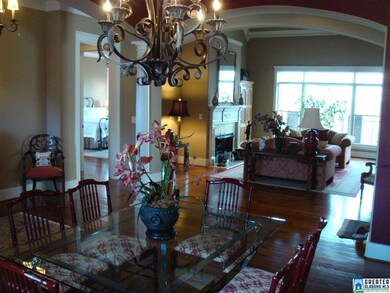 Looking from the dining room into the two story li