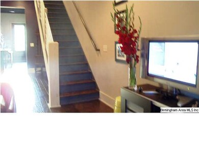 Stairway leads to two Large bedrooms -- two full b