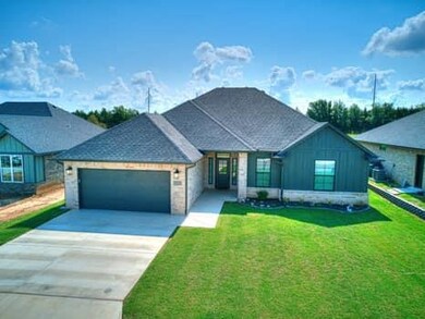 View of front of property with a front yard and a 