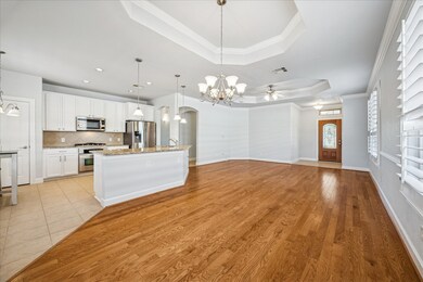 Wood and tile throughout the home.