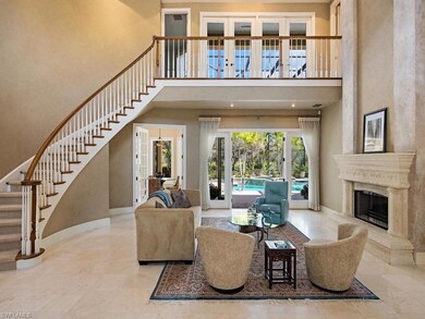 Living Room with Marble Floors and Fireplace