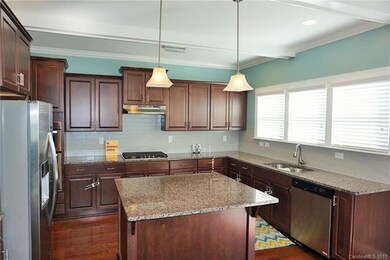 HARDWOODS / GRANITE KITCHEN & ISLAND / TILE BACKSP