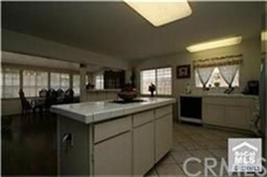Huge center island in kitchen makes it easy to pre