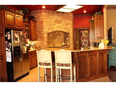 Kitchen. View into kitchen with Bar seating