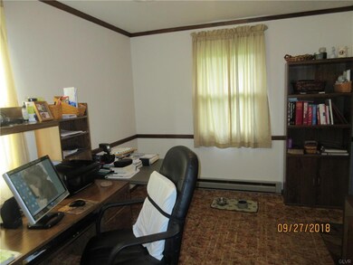 Formal dining room, freshly painted.  Hardwood und