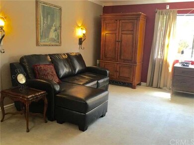 Ground level, single story end unit is located wit