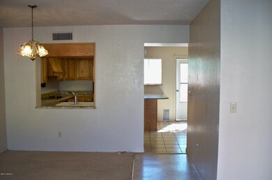 Pass-thru to custom designed kitchen.