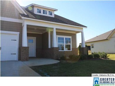 Craftsman Style at it's best! Brick accents and wh