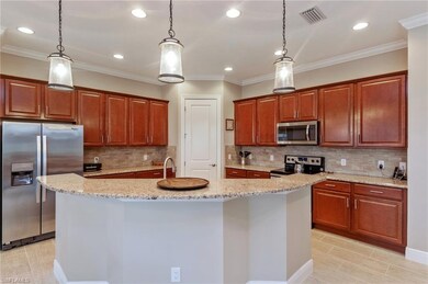 Kitchen with counter top bar for added dining spac