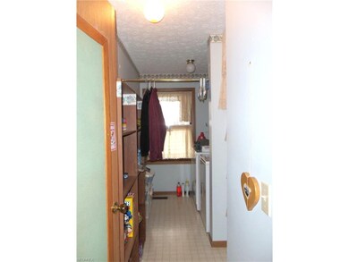 Laundry room with large pantry area off kitchen