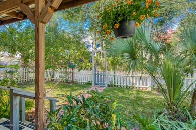 Picket fenced front yard is sweet