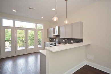 Kitchen picture may be for a different unit, but s