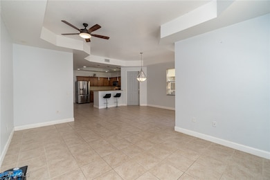 Unfurnished living room featuring visible vents, b