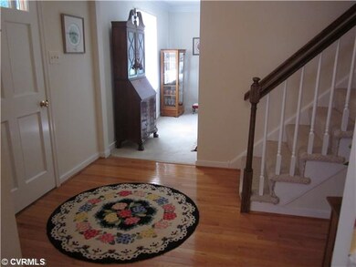 Foyer - Beautiful Foyer with Hardwood Floors, Half