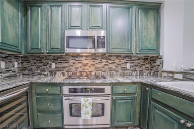 Upgraded kitchen cabinets, tiled backsplash, upgra