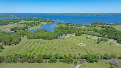 Aerial view of sparsely populated area with a nearby body of water