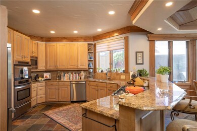 This gorgeous kitchen features stainless appliance