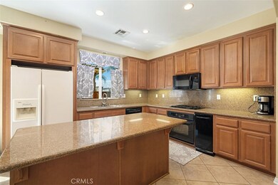 COMFORTABLE ISLAND SEATING FOR 3 OR 4.