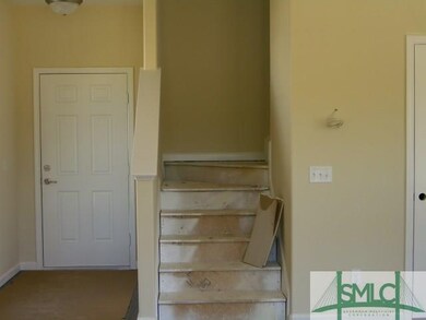 VIEW OF FRONT ENTRY FOYER AND STAIRWAY LEADING TO 