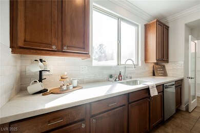 Kitchen featuring a sink, dishwasher, ornamental m