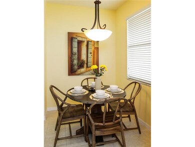 The spacious breakfast nook is filled with morning