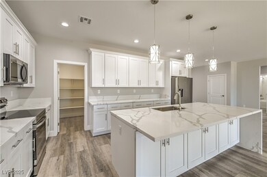 Kitchen with light wood finished floors, a kitchen