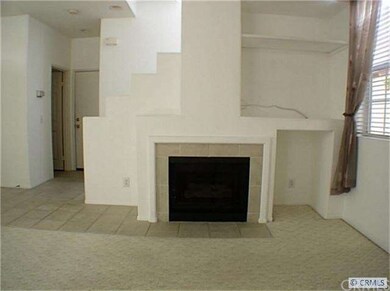 Living Room with 10 Foot Ceilings and Gas Fireplac
