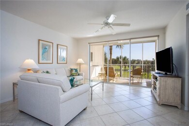 Tiled living room with ceiling fan