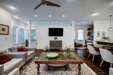 The home’s open-concept architecture, showcasing abundant natural light and clean design lines