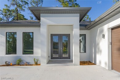 Doorway to property with french doors