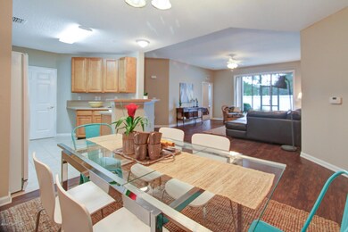 VIEW OF LIVING ROOM FROM DINING AREA