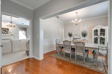 The Dining Room showcases the home's neutral decor & new paint.