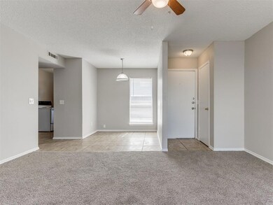 Living Room looking into Dining Room & Front Door