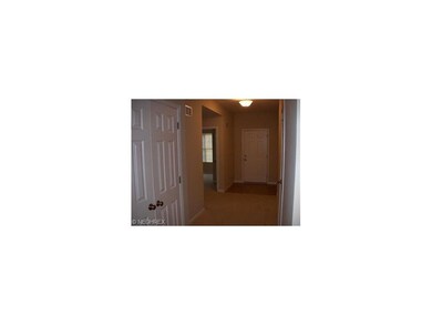 Nice wide entry foyer. Ceramic tile by front door.