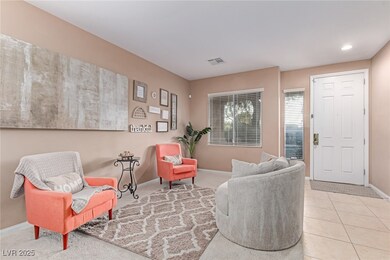 Sitting room featuring baseboards, recessed lighti