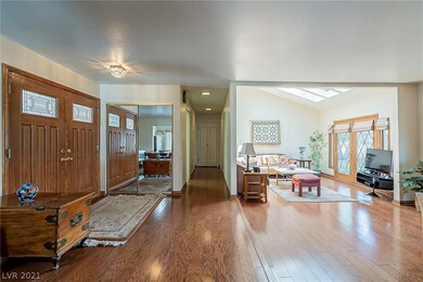 Enjoy this open living space with its wood floorin