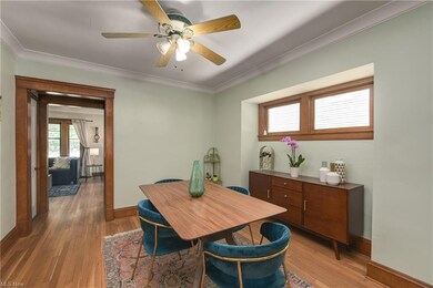 Dining room area has refinished original floors, and a convenient nook to place your buffet or sideboard.
