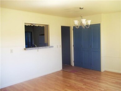 Dining Room. Cut out to kitchen with granite servi