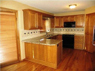 Kitchen with granite countertops