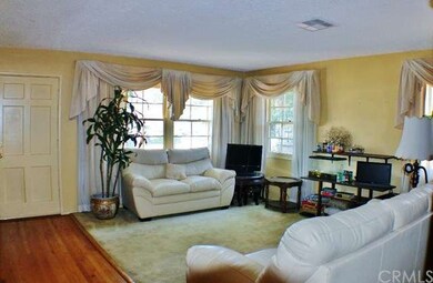 Living Room Opens to Dining Room