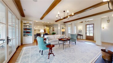 Open floorplan with beamed ceilings