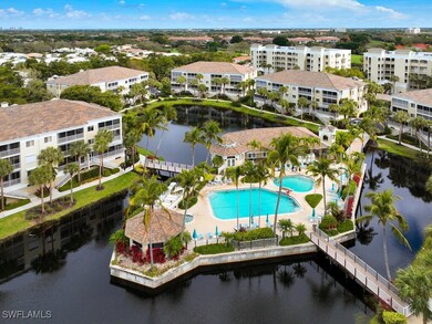 7655 Pebble Creek Cir unit 404, Naples, FL 34108 - photo 2